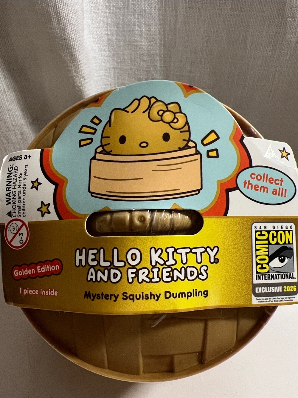 San diego comic con exclusive Hello Kitty Gold  Mystery Squishy Dumpling Toy